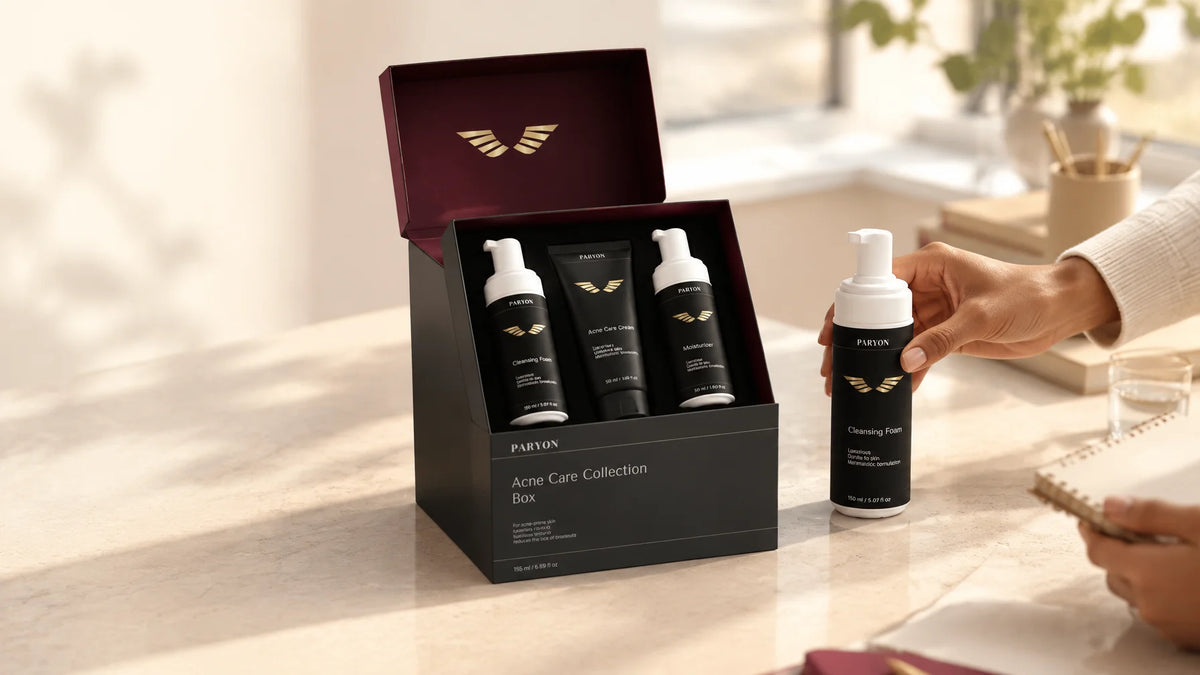 PARYON Acne Care Collection Box, exact from ref r04, open and large on a pale stone consultation tab